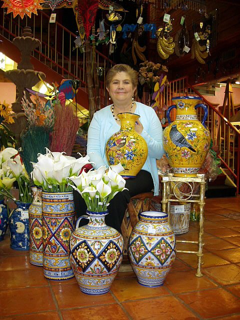 Edali surrounded by her Talavera pottery collection